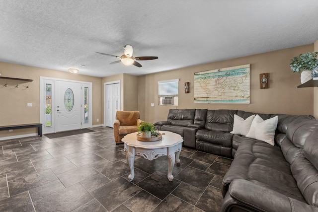 640 3rd St N, Dassel, MN 55325 - living area featuring a ceiling fan, cooling unit, and a textured ceiling