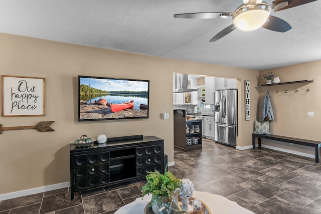 640 3rd St N, Dassel, MN 55325 - living room featuring a textured ceiling and a ceiling fan