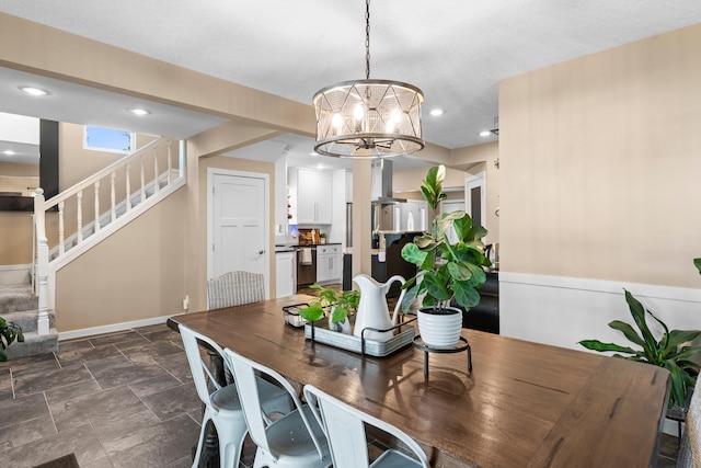 640 3rd St N, Dassel, MN 55325 - dining room featuring stairway, a chandelier, recessed lighting, and dark stone finish floors