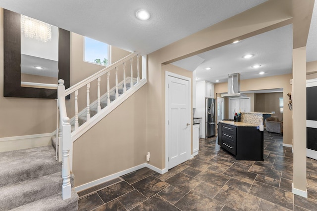 640 3rd St N, Dassel, MN 55325 - kitchen with island exhaust hood, stainless steel refrigerator with ice dispenser, dark cabinetry, a kitchen island, and recessed lighting