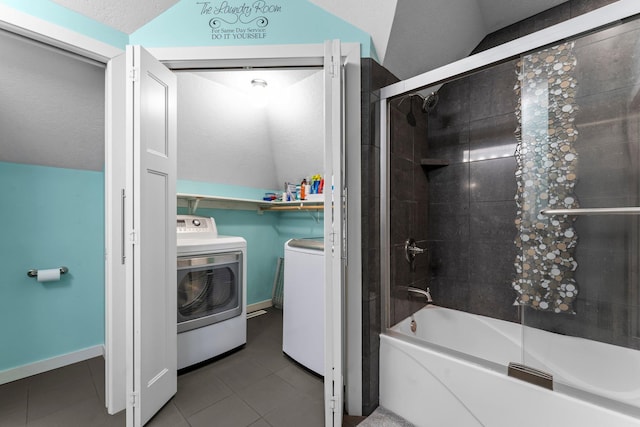 640 3rd St N, Dassel, MN 55325 - bathroom with independent washer and dryer, shower / bath combination with glass door, tile patterned flooring, and lofted ceiling