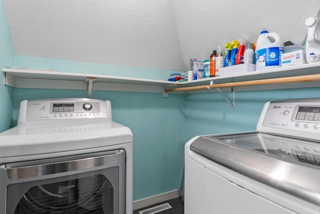 640 3rd St N, Dassel, MN 55325 - laundry area with washing machine and clothes dryer and baseboards