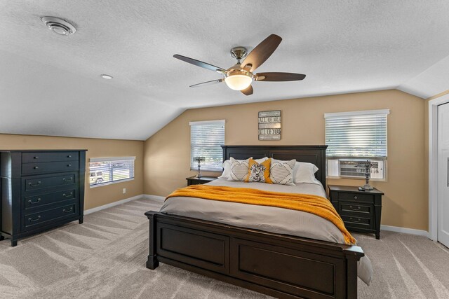 640 3rd St N, Dassel, MN 55325 - bedroom with lofted ceiling, light carpet, ceiling fan, a textured ceiling, and cooling unit