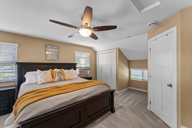 640 3rd St N, Dassel, MN 55325 - bedroom with light carpet, a closet, a textured ceiling, a ceiling fan, and vaulted ceiling