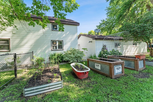 640 3rd St N, Dassel, MN 55325 - back of property with a vegetable garden