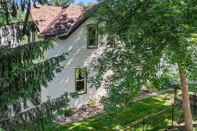 640 3rd St N, Dassel, MN 55325 - view of side of property with a shingled roof