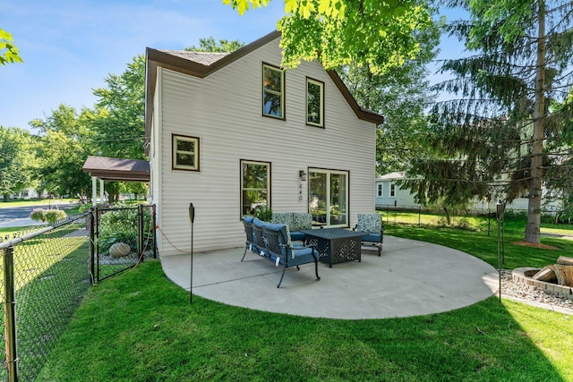 640 3rd St N, Dassel, MN 55325 - rear view of property featuring a patio, a fenced backyard, and an outdoor hangout area