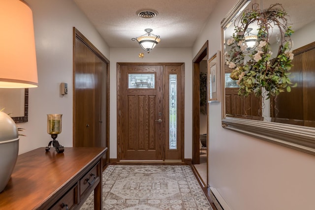 102 Terrace Vw E, Decoria Twp, MN 56001 - foyer featuring a textured ceiling and baseboards