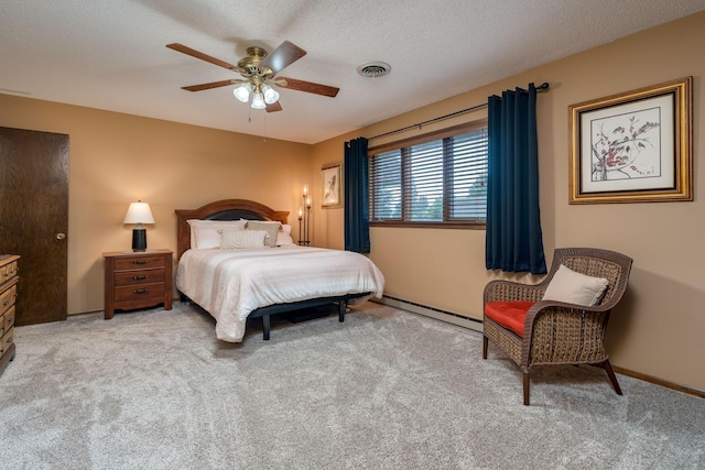 102 Terrace Vw E, Decoria Twp, MN 56001 - bedroom with a baseboard heating unit, carpet floors, and ceiling fan