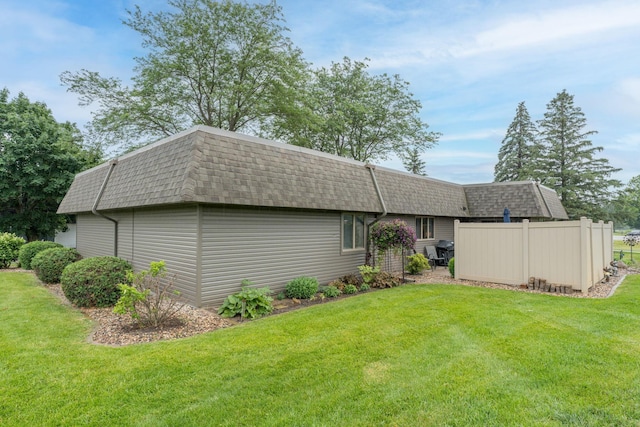102 Terrace Vw E, Decoria Twp, MN 56001 - rear view of property featuring a shingled roof and mansard roof