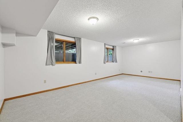 1378 Dunsmore Dr, Waconia, MN 55387 - below grade area featuring carpet and a textured ceiling