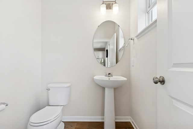 6645 Jody Ave S, Cottage Grove, MN 55016 - bathroom featuring toilet and wood finished floors