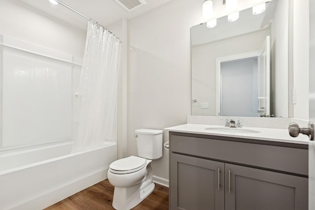 6645 Jody Ave S, Cottage Grove, MN 55016 - full bathroom with wood finished floors, vanity, and shower / tub combo