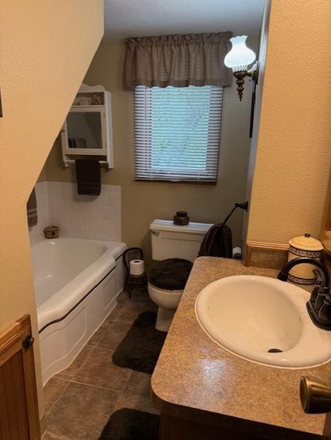 688 Miller Ave, Windom, MN 56101 - bathroom with a tub to relax in, vanity, and tile patterned flooring