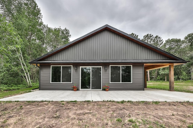 19566 Early Bird Dr, Park Rapids, MN 56470 - back of property with a patio area