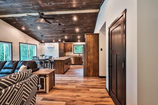 19566 Early Bird Dr, Park Rapids, MN 56470 - living room with vaulted ceiling, light wood finished floors, wooden ceiling, ceiling fan, and recessed lighting