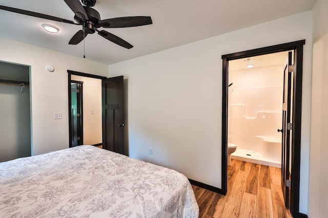 19566 Early Bird Dr, Park Rapids, MN 56470 - bedroom with light wood finished floors, a closet, ensuite bathroom, and ceiling fan