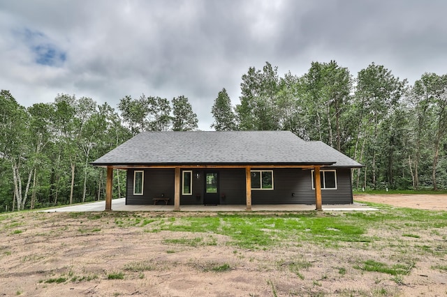 19566 Early Bird Dr, Park Rapids, MN 56470 - view of front of house featuring covered porch and a shingled roof