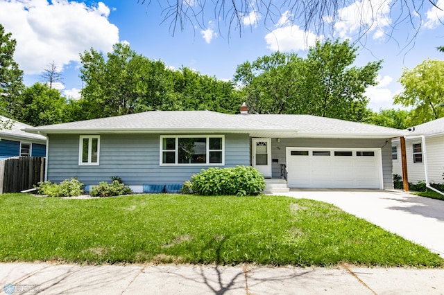 420 17th St S, Moorhead, MN 56560 - single story home featuring an attached garage, driveway, and a shingled roof