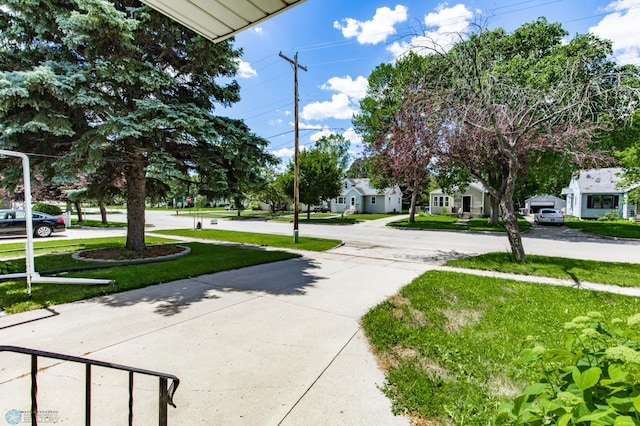 420 17th St S, Moorhead, MN 56560 - view of property's community featuring a lawn and a residential view