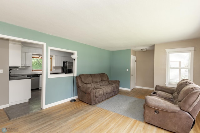 420 17th St S, Moorhead, MN 56560 - living area with wood finished floors and baseboards