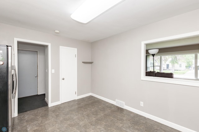 420 17th St S, Moorhead, MN 56560 - spare room featuring baseboards