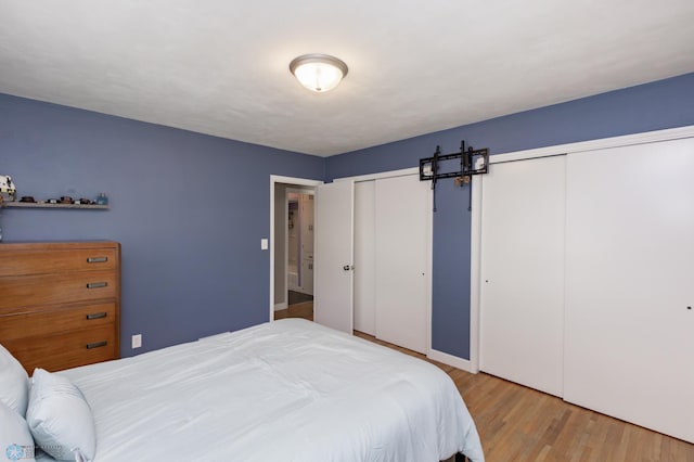 420 17th St S, Moorhead, MN 56560 - bedroom with two closets and wood finished floors