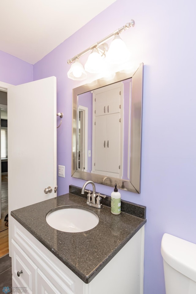 420 17th St S, Moorhead, MN 56560 - bathroom featuring vanity and toilet