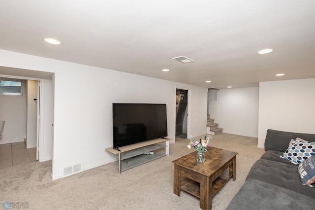 420 17th St S, Moorhead, MN 56560 - carpeted living room featuring stairway and recessed lighting