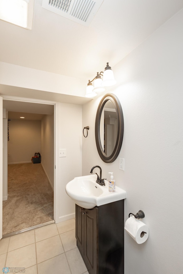 420 17th St S, Moorhead, MN 56560 - bathroom featuring vanity and tile patterned flooring