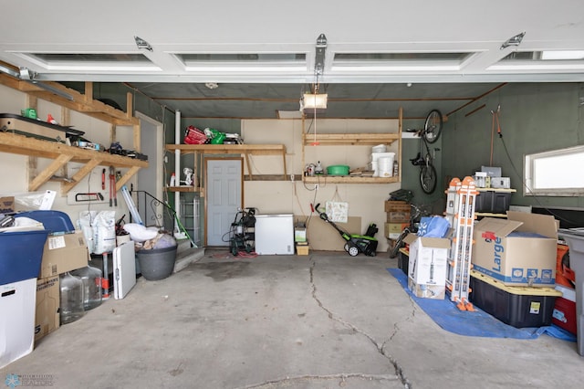 420 17th St S, Moorhead, MN 56560 - garage featuring a garage door opener