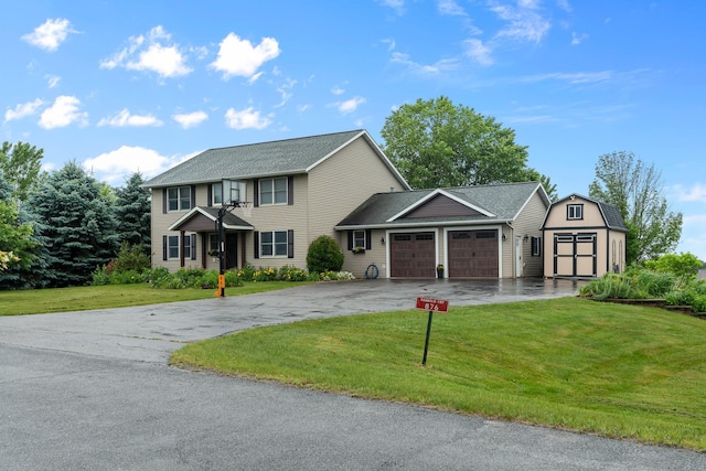 876 162nd St, Hammond, WI 54015 - colonial home with a garage, asphalt driveway, a front yard, a shed, and roof with shingles