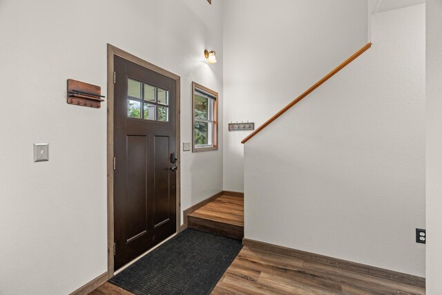 876 162nd St, Hammond, WI 54015 - foyer with dark wood finished floors and stairway