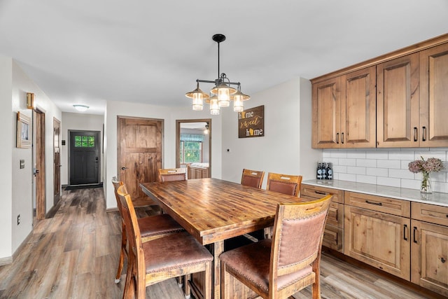 876 162nd St, Hammond, WI 54015 - dining space featuring light wood-type flooring and a chandelier