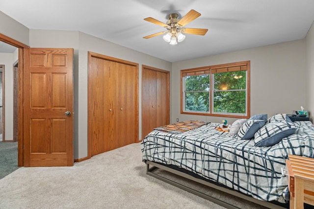 876 162nd St, Hammond, WI 54015 - carpeted bedroom featuring multiple closets and a ceiling fan