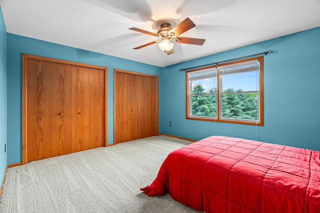 876 162nd St, Hammond, WI 54015 - carpeted bedroom featuring two closets and a ceiling fan