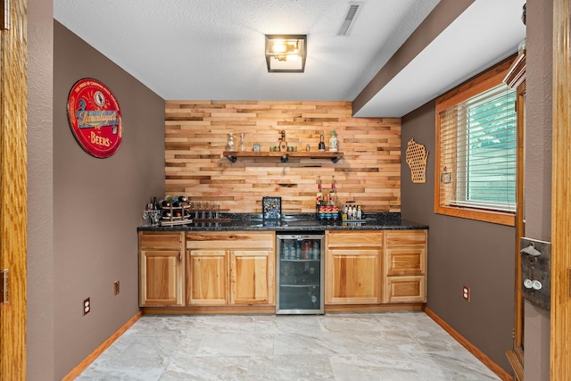 876 162nd St, Hammond, WI 54015 - indoor wet bar with beverage cooler and wood walls