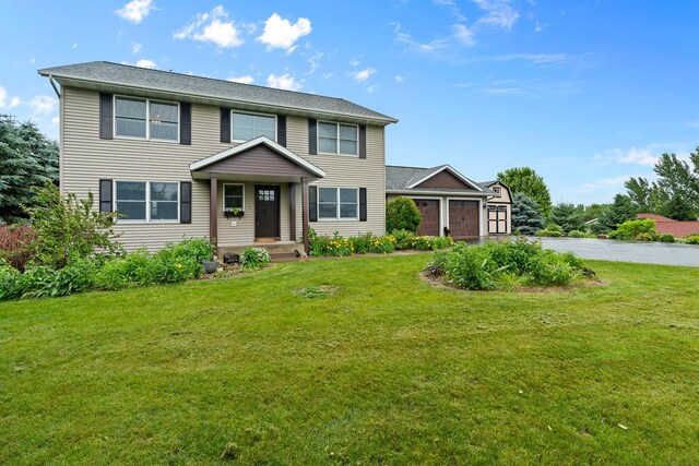 876 162nd St, Hammond, WI 54015 - view of front of home with a garage, driveway, and a front lawn