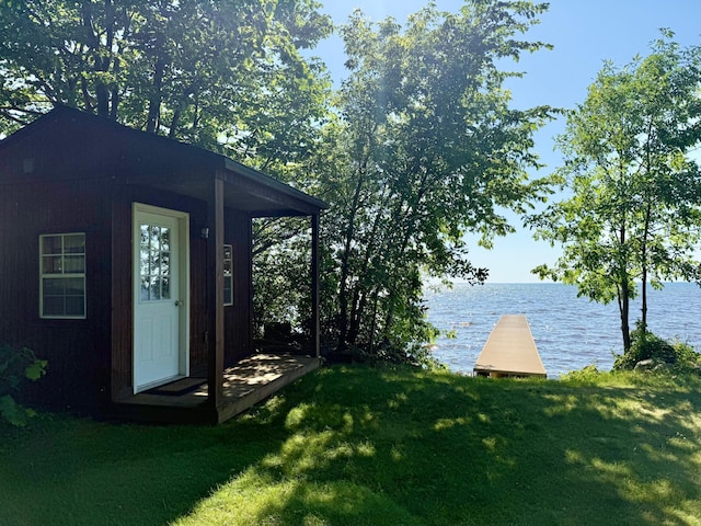 21393 324th Pl, Lakeside Twp, MN 56342 - view of green lawn with a water view and an outbuilding