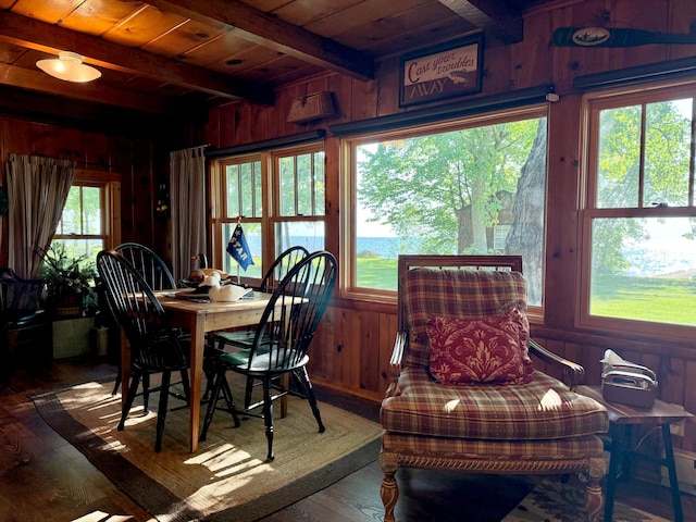 21393 324th Pl, Lakeside Twp, MN 56342 - dining space featuring wooden walls, wood finished floors, and a wooden ceiling with exposed beams