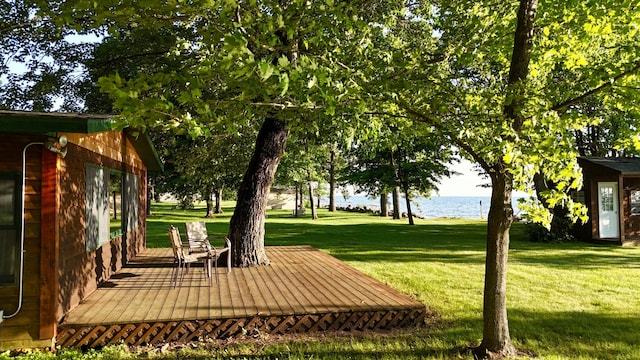 21393 324th Pl, Lakeside Twp, MN 56342 - view of grassy yard featuring a deck with water view
