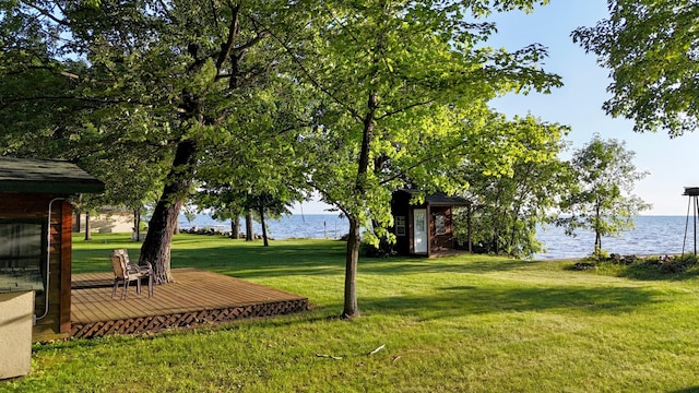 21393 324th Pl, Lakeside Twp, MN 56342 - view of green lawn with a deck with water view