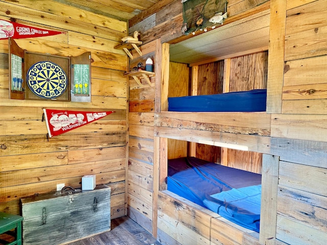 21393 324th Pl, Lakeside Twp, MN 56342 - unfurnished bedroom featuring wood walls, wood finished floors, a sauna / steam room, and wooden ceiling