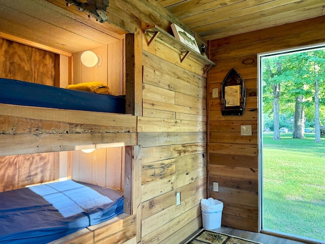 21393 324th Pl, Lakeside Twp, MN 56342 - bedroom featuring wood walls and wood ceiling