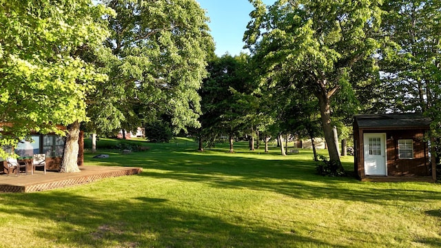 21393 324th Pl, Lakeside Twp, MN 56342 - view of green lawn with a wooden deck