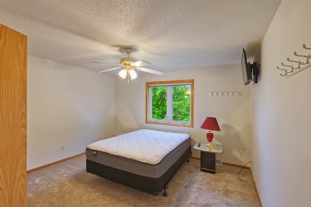 343 Perch Ln, Winsted, MN 55395 - bedroom with carpet floors, ceiling fan, and a textured ceiling