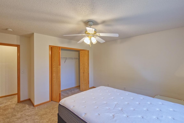 343 Perch Ln, Winsted, MN 55395 - bedroom featuring a closet, light carpet, and a ceiling fan
