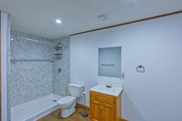 343 Perch Ln, Winsted, MN 55395 - full bathroom with a textured ceiling, a shower, vanity, wood finished floors, and crown molding