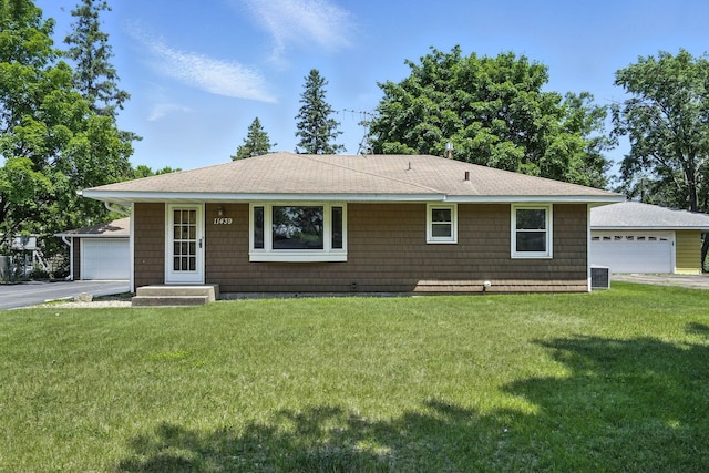11439 Heights Dr NW, Coon Rapids, MN 55433 - ranch-style home featuring a front yard, a garage, and a shingled roof