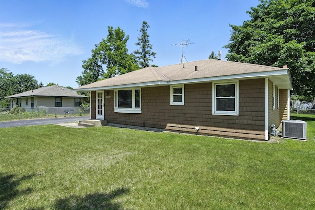 11439 Heights Dr NW, Coon Rapids, MN 55433 - ranch-style house with a front lawn and roof with shingles